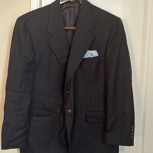 Etienne Aigner black pin striped suit jacket.